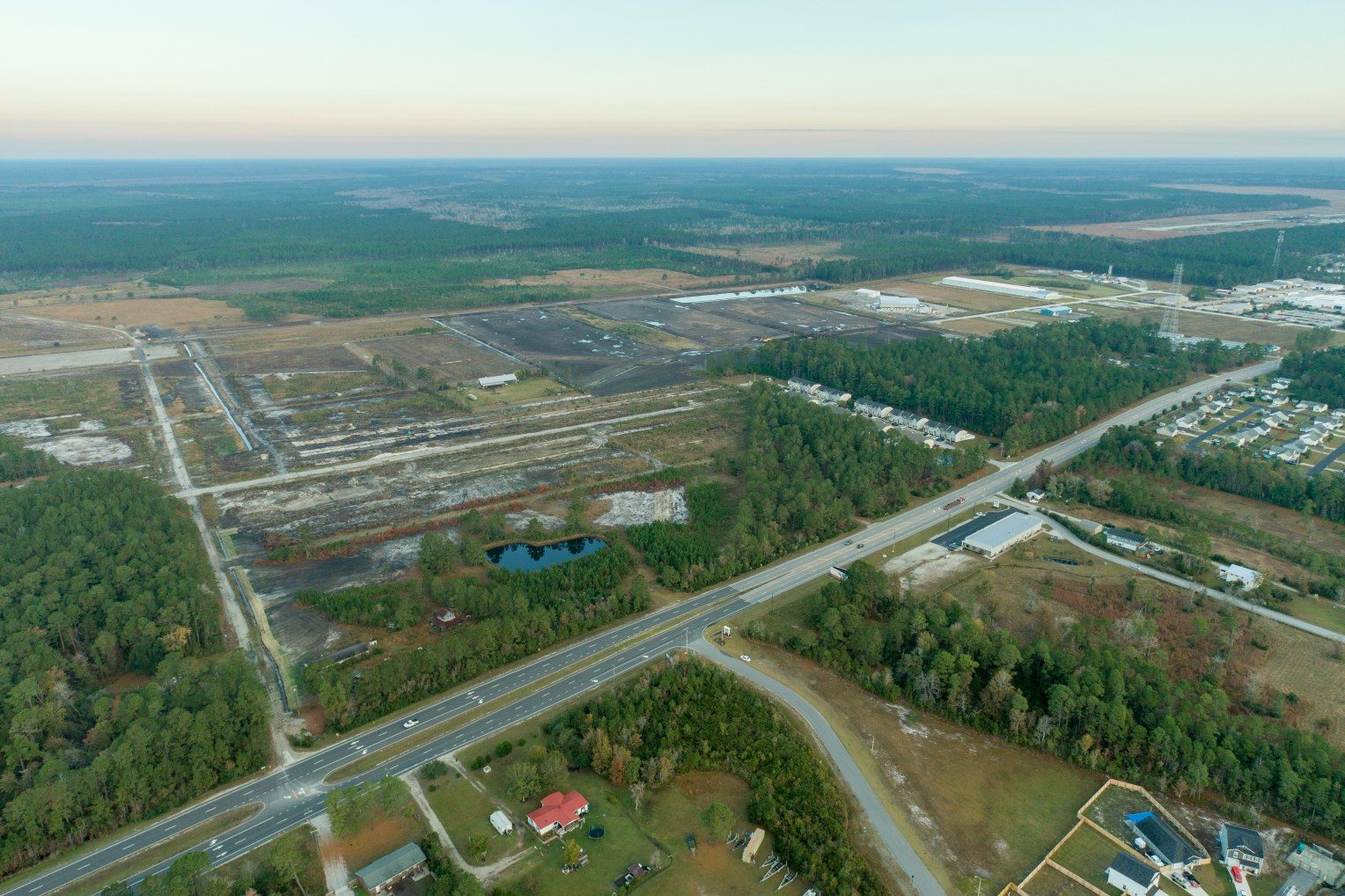 Aerial view of finished building pads and internal roads inside Camp Davis Industrial Park Phase II
